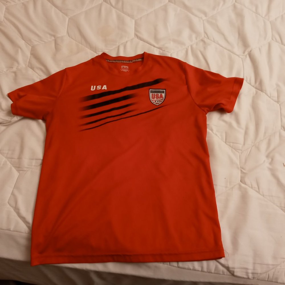 striker soccer red shirt